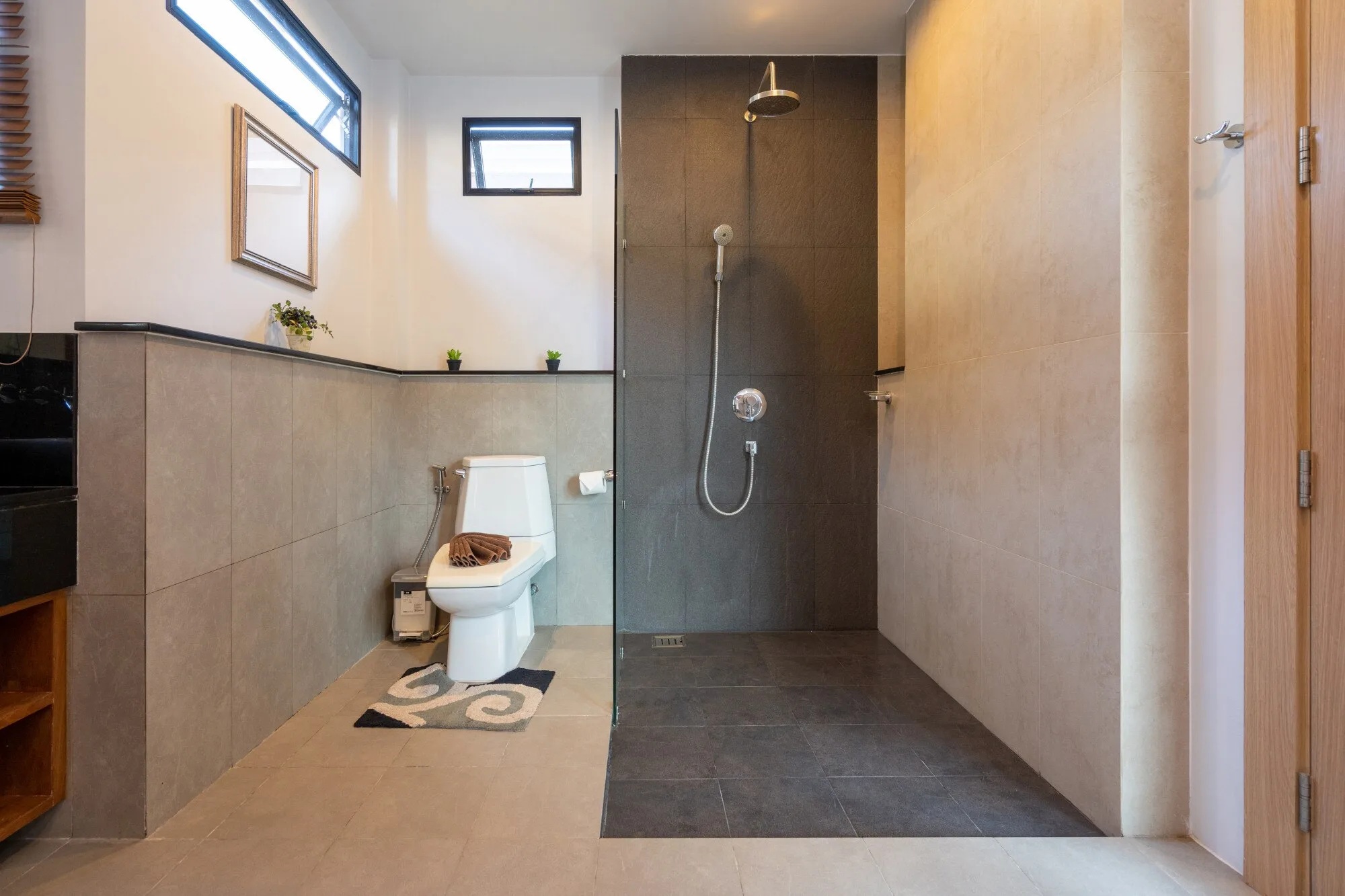 Residential bathroom with an open curbless shower